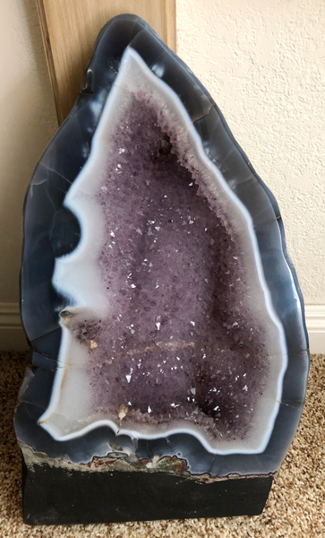 A large Amethyst Quartz Crystal Geode, approximately 24 inches tall and weighing 30 pounds.