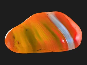 Orange stone with white banding.