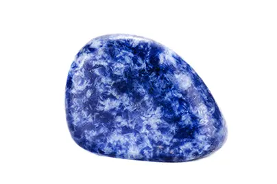 A smooth round blue stone with white speckles.